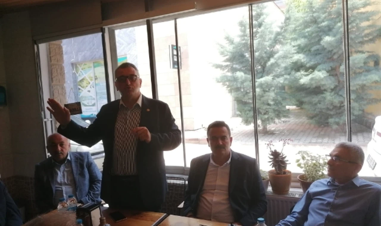 AK PARTİ MUHTARLARLA BULUŞTU