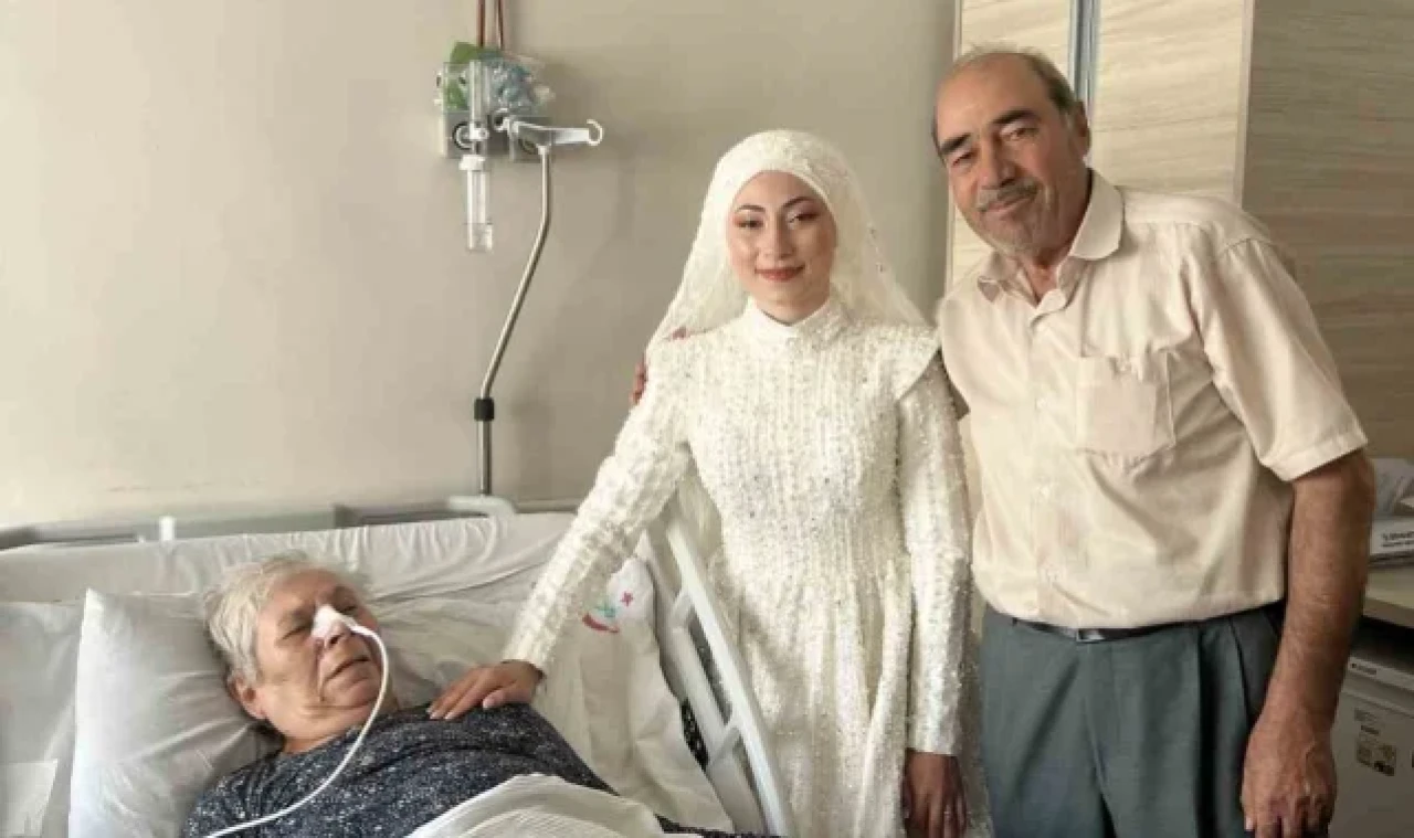 Hastanedeki babaannesini gelinliğiyle ziyaret etti