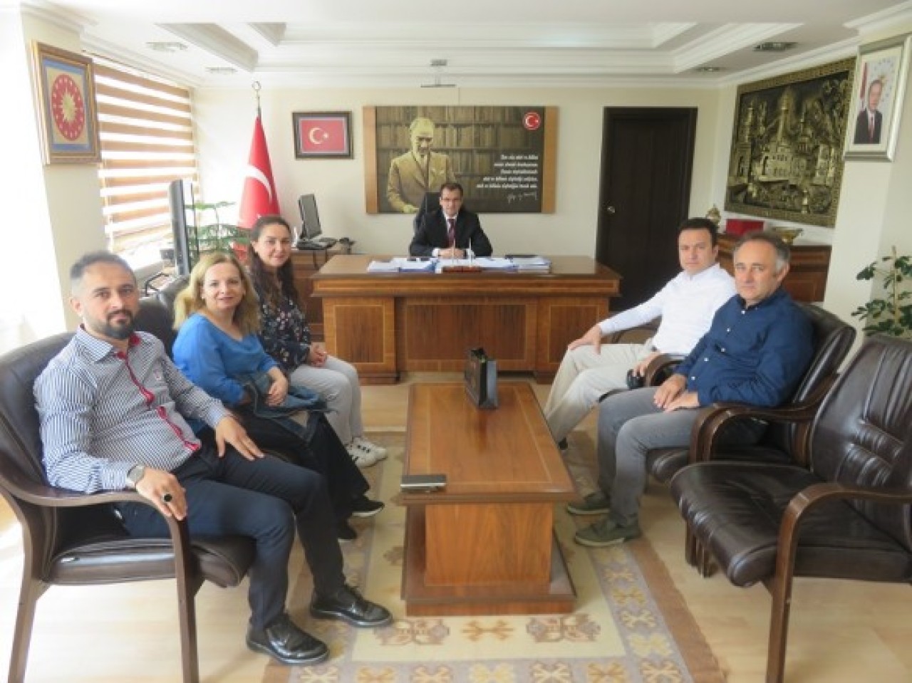 ÇİMEN VE YÖNETİMİ KAYMAKAM GÜLDOĞAN’I ZİYARET ETTİ