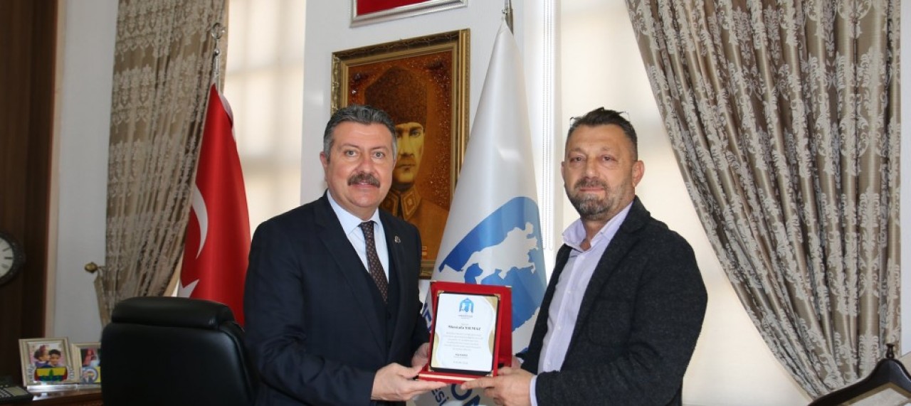 KARGI’DAN GÖREVİNDEN AYRILAN YILMAZ’A TEŞEKKÜR PLAKETİ