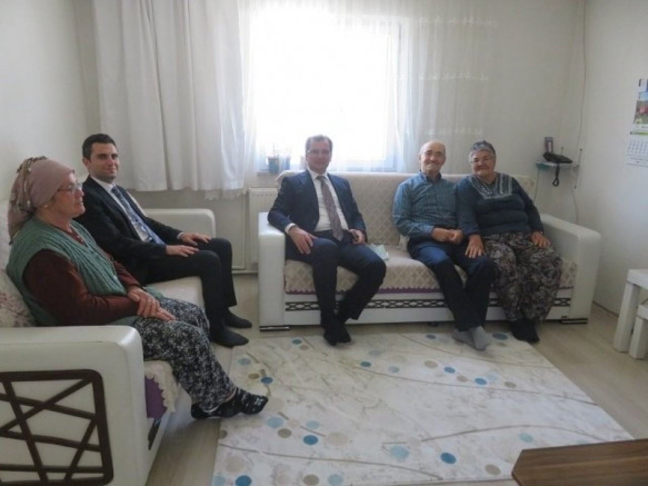 KAYMAKAM GÜLDOĞAN’DAN ŞEHİT AİLELERİ VE GAZİLERE ZİYARET