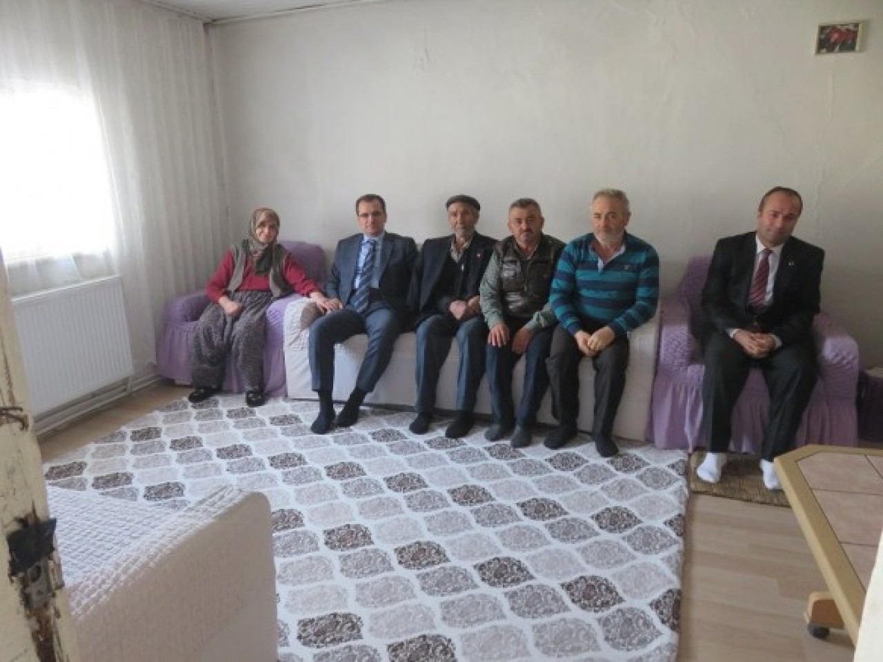 ŞEHİT AİLESİNİ ZİYARET ETTİ