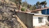 Otluk alanda çıkan yangın eve sıçramadan söndürüldü