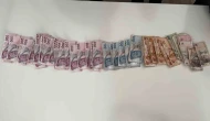 Esnaftan para toplayan dilencinin üzerinden 9 bin TL çıktı