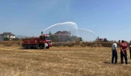 Otluk alandaki yangın evlere sıçramadan söndürüldü
