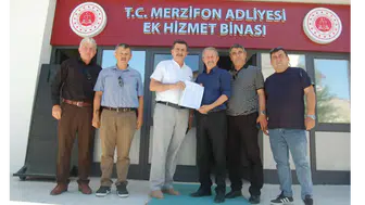 MHP Merzifon'da Yeni Dönem Resmen Başladı! Başkan Cüneyt Yamak Mazbatasını Aldı