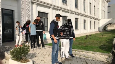 Hırsızlık suçundan yakalandı, kucağında bebekle adliyeye sevk edildi