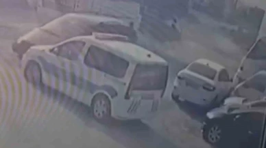 Yaralı polislerin, suçlunun peşini bir an olsun bırakmaması kameraya yansıdı