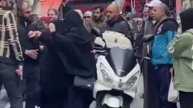 Çarşaflı kadın böyle darbedildi, çevredekiler film izler gibi izledi