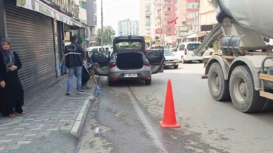 İş yerine düzenlenen silahlı saldırıda otomobiliyle seyreden kadın sürücü vuruldu