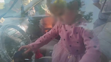 Arabada mahsur kalan çocuk dakikalar süren uğraşın sonunda kurtarıldı