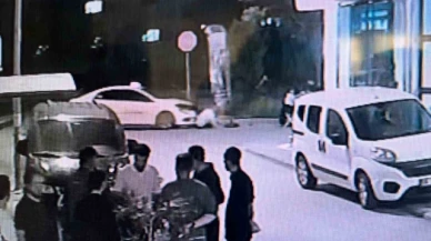 Kayan taksisini durdurmaya çalışan sürücü altında kaldı