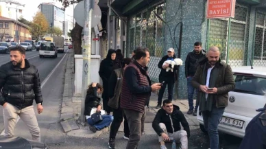 Otomobille çarpışarak fırlayan motosikletli yayanın üzerine düştü: 2 yaralı