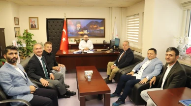 Rektör Turabi’den Başhekim Sezgin’e Hayırlı Olsun Ziyareti