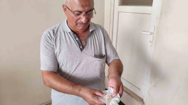 Aldığı ekmekten vida çıktığını iddia etti