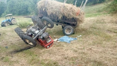 Tarlada devrilen traktörün altında kalan sürücü ağır yaralandı