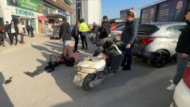 Kamyonetin açık kapısına çarpan motosiklet sürücüsü yaralandı