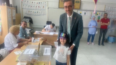 AK PARTİ İLÇE BAŞKANI KUZUCU OYUNU KULLANDI