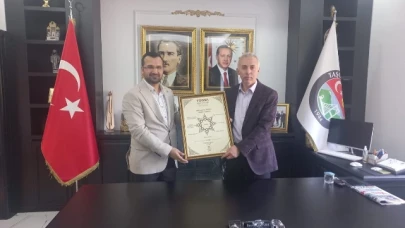 TÜGVA'DAN ÖZTÜRK'E ZİYARET