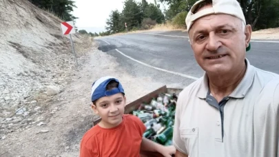 Dağ yolu ve etrafına atılan alkol şişelerini topladılar
