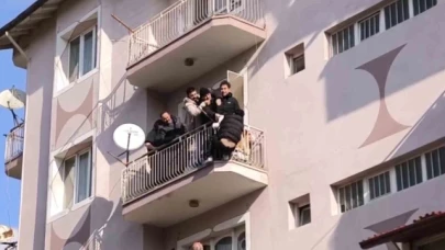45 yıl hapisle aranan genç sarktığı balkonda polisten kaçamadı