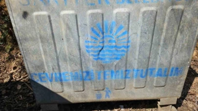 Çöp konteynerindeki yazı cesede götürdü