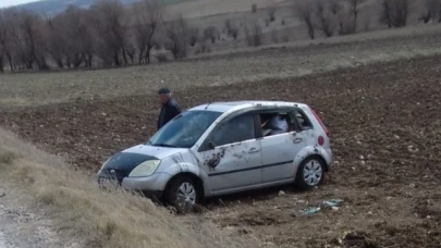 Takla atan otomobilden yara almadan kurtuldu