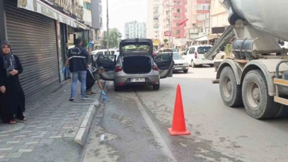 İş yerine düzenlenen silahlı saldırıda otomobiliyle seyreden kadın sürücü vuruldu