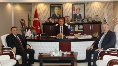 Turabi’den DOKAP Başkanı Gültekin'e Ziyaret