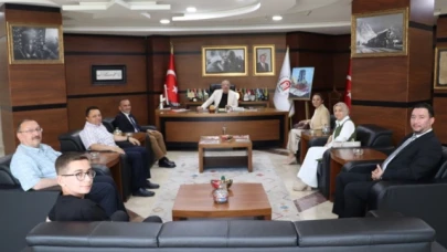 Panelistlerden Rektör Turabi'ye Ziyaret