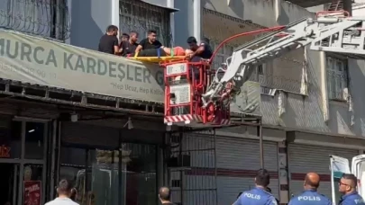 Damdan düşen kadın itfaiye tarafından kurtarıldı