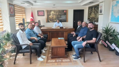 Karaöz ve Yönetimi Kaymakam Karaaslan'ı ziyaret etti