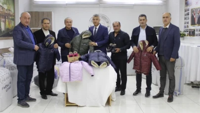 Amasya TSO'dan 263 öğrenciye mont ve ayakkabı desteği