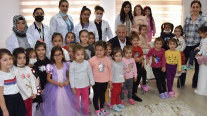 BAŞKAN  AMCALARINDAN MİNİKLERE  ZİYARET