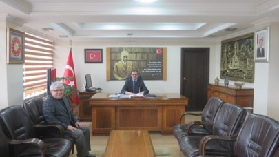 DEKAN AYDIN, KAYMAKAM GÜLDOĞAN’I ZİYARET ETTİ