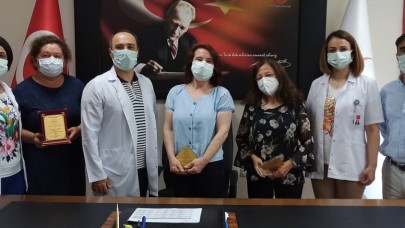 EMEKLİ PERSONELE PLAKETLİ TEŞEKKÜR