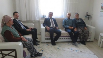 KAYMAKAM GÜLDOĞAN’DAN ŞEHİT AİLELERİ VE GAZİLERE ZİYARET