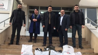 ÜLKÜCÜ GENÇLİK İHTİYAÇ SAHİBİ ÖĞRENCİLERİN YANINDA