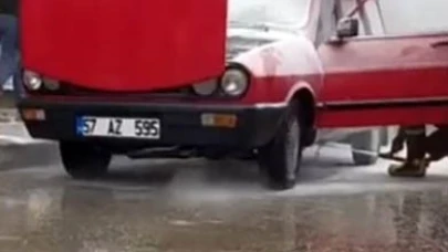 Yanan otomobile esnafın müdahalesi faciayı önledi