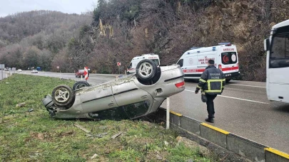 Takla atan otomobildeki 3 kişi yaralandı