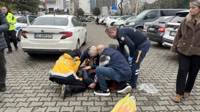 Geri manevra yapan otomobilin çarptığı kadın yaralandı